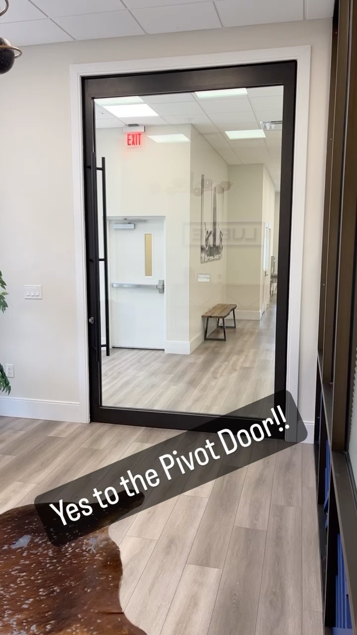 We love our Pivot Door here at LUBKE! Let us design and Build a home for you with one! #custom #designbuild #customhomes